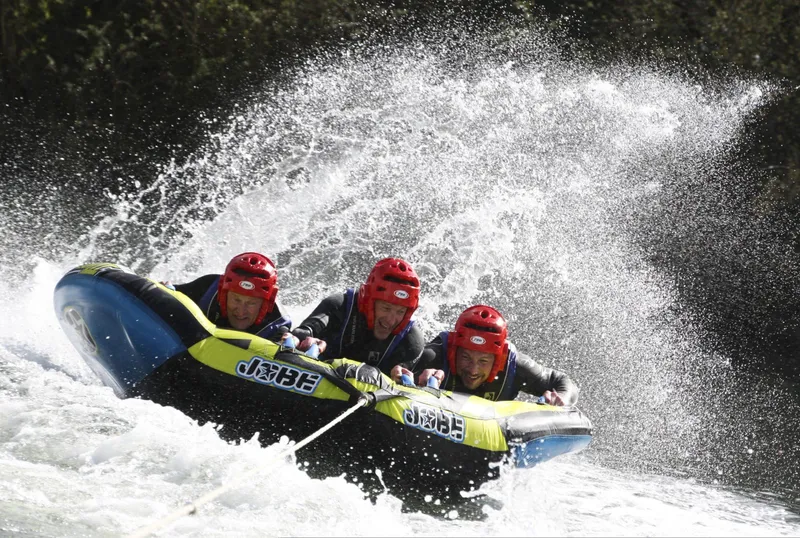 A group on a high-speed water sports ride at sea